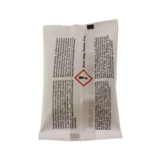 Sur cette photo, nous voyons un sachet détartrant pour cafetière de la marque Home Equipement, vue de verso, sur lequel nous pouvons lire les mises en gardes concernant le produit